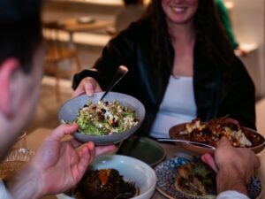 Couple enjoying a wonderful meal at Inara, Busselton
