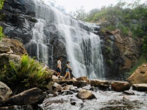 Couple hiking to Mackenzie Falls, Grampians National Park
