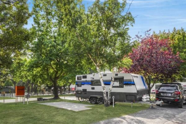 Powered slab camping site at Breeze Holiday Parks - Halls Gap