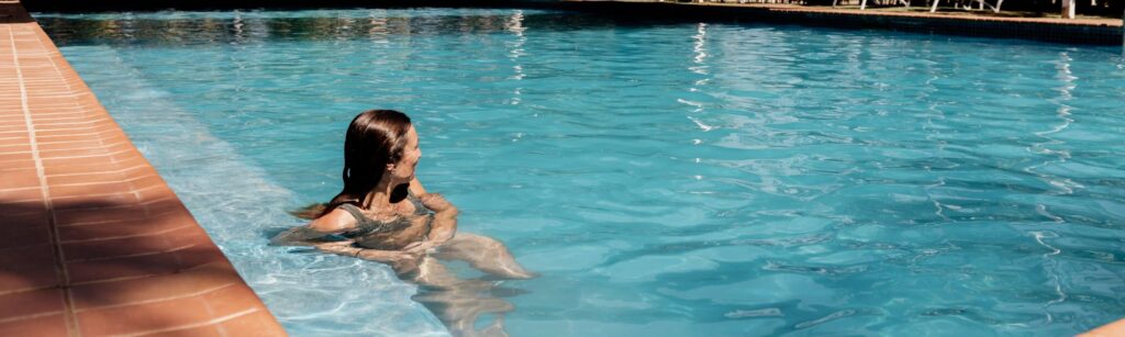 Women enjoying Breeze Holiday Parks - Katherine swimming pool, Summer Park and Save, Stay 3 Pay 2 Summer
