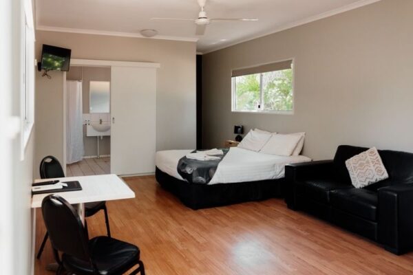 Breeze Holiday Parks - Katherine, Accessible Ensuite Cabin, accessible bedroom, living room