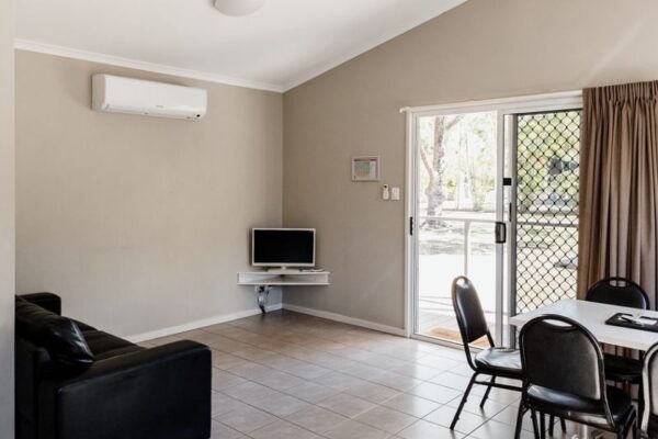Breeze Holiday Parks - Katherine, Two Bedroom Deluxe Cabin, living room, dinning room