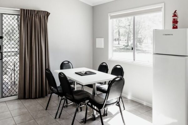 Dining area of Deluxe Two-Bedroom Cabin at BIG4 Breeze Holiday Parks - Katherine